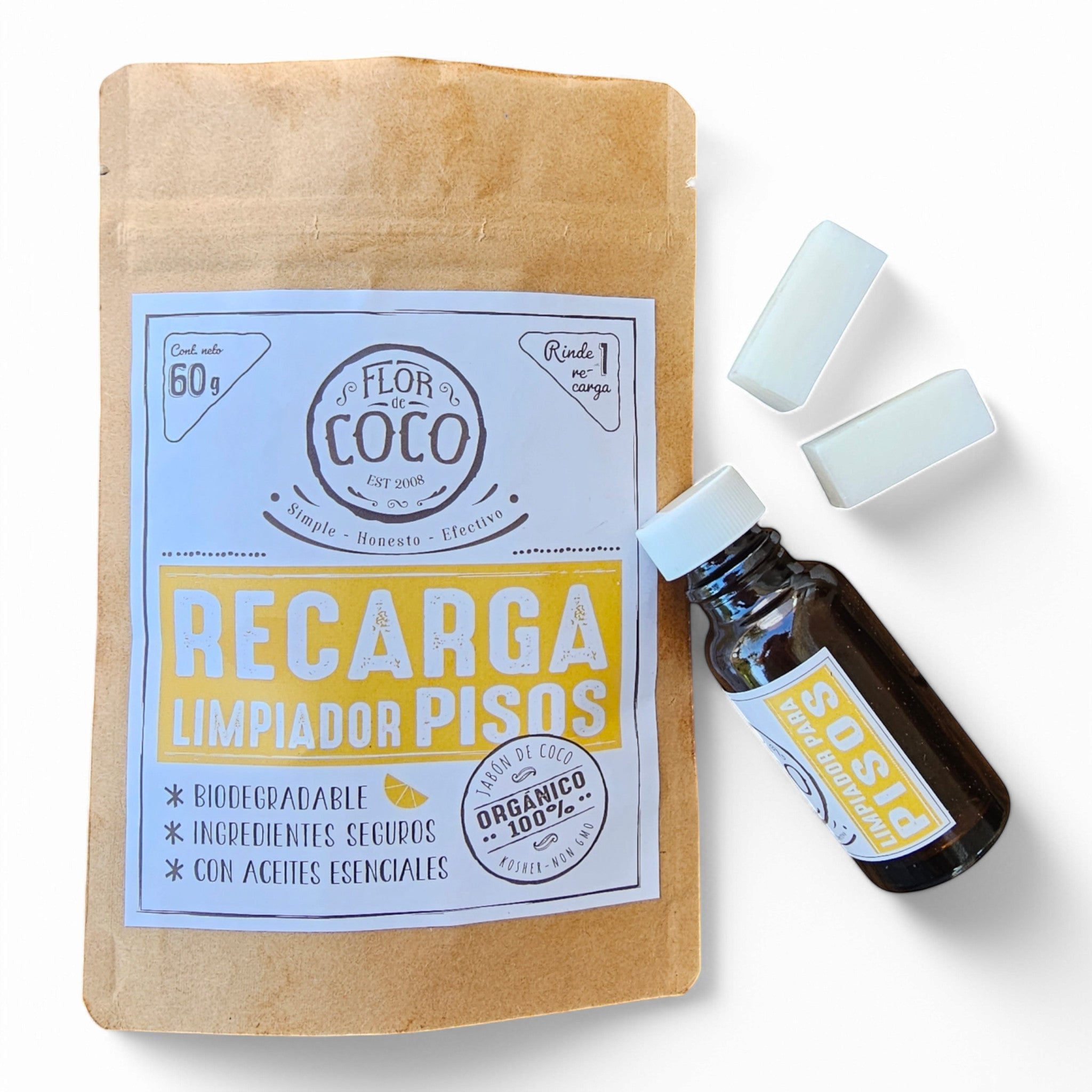 Flor de Coco refill for citrus floor cleaner, includes 2 soap tablets and essential oil bottle. Biodegradable, safe ingredients.