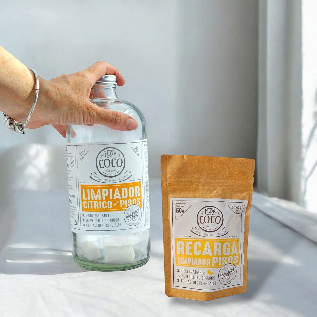 Flor de Coco refill for citrus floor cleaner, includes soap tablets and essential oils. Biodegradable, organic ingredients.